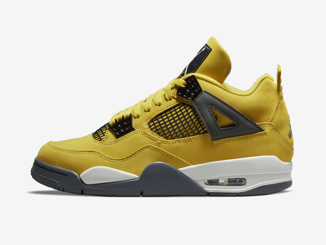 Exclusive Jordan 4 shoes with a unique yellow colour scheme.
