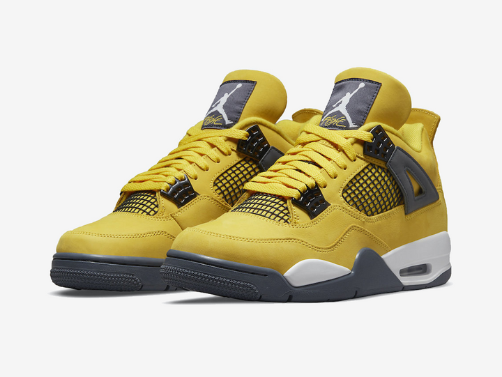 Exclusive Jordan 4 shoes with a unique yellow colour scheme.