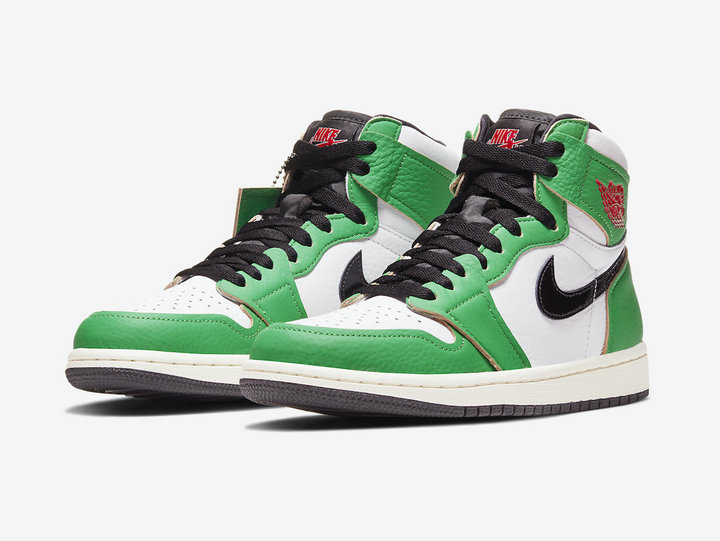 Timeless Air Jordan 1 High sneakers in a classic green and white colour scheme.