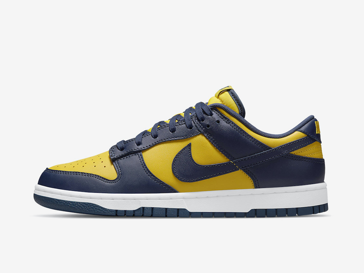 Classic Nike Dunk shoes with a yellow and blue colourway.