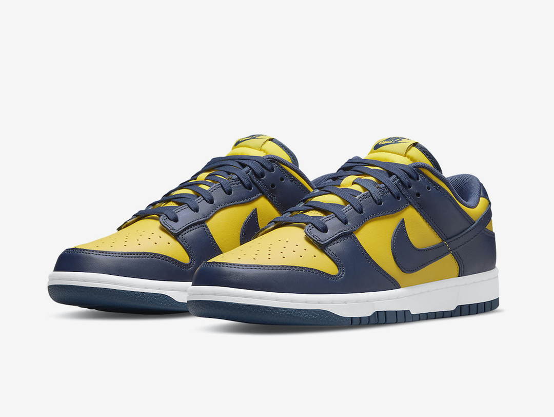 Classic Nike Dunk shoes with a yellow and blue colourway.