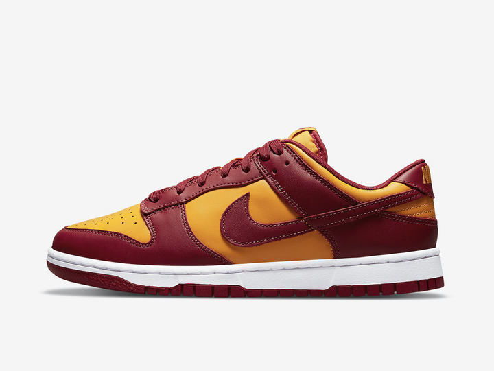 Timeless Nike Dunk sneakers in a classic yellow and red colour scheme.