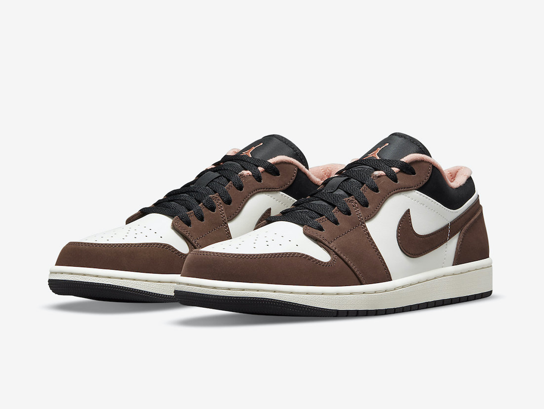 Classic Jordan 1 Low shoes with a brown, white, and black colourway.