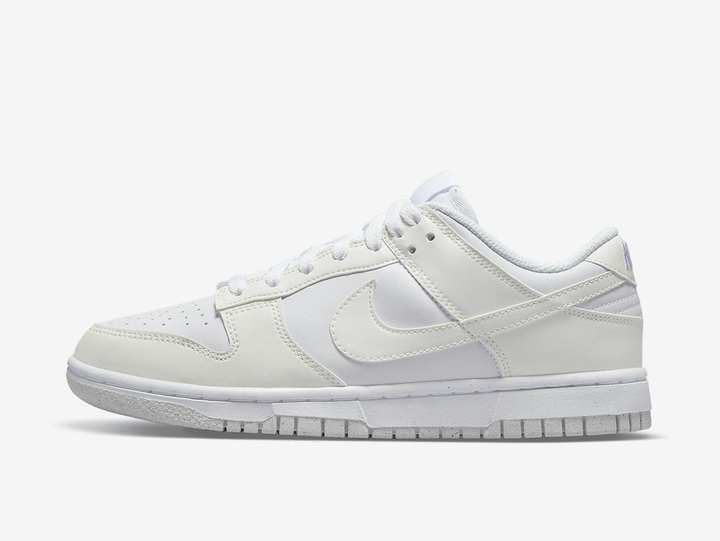 Classic Nike Dunk shoes with an all white colourway.