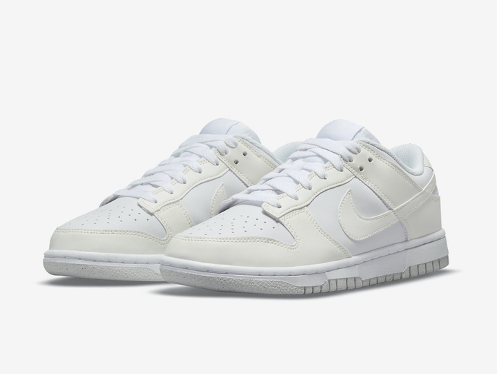 Classic Nike Dunk shoes with an all white colourway.