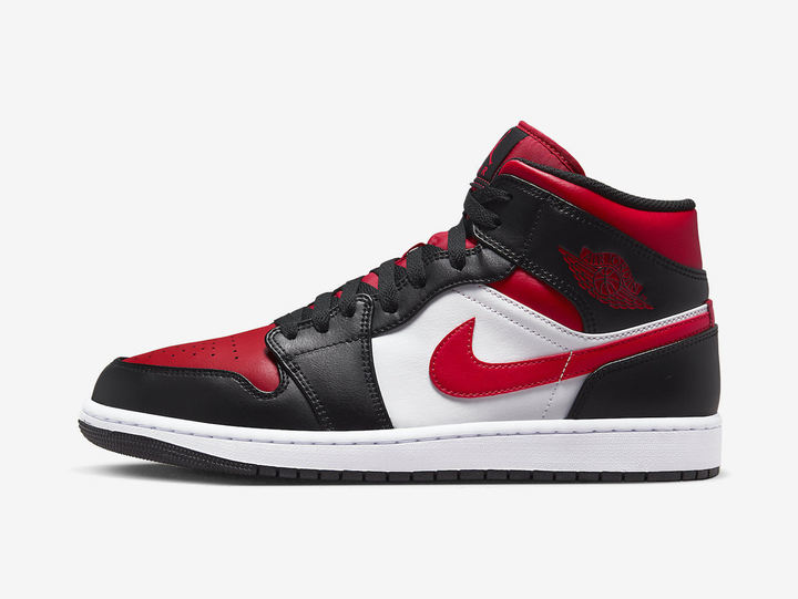 Classic Jordan 1 Mid shoes with a red, white, and black colourway.