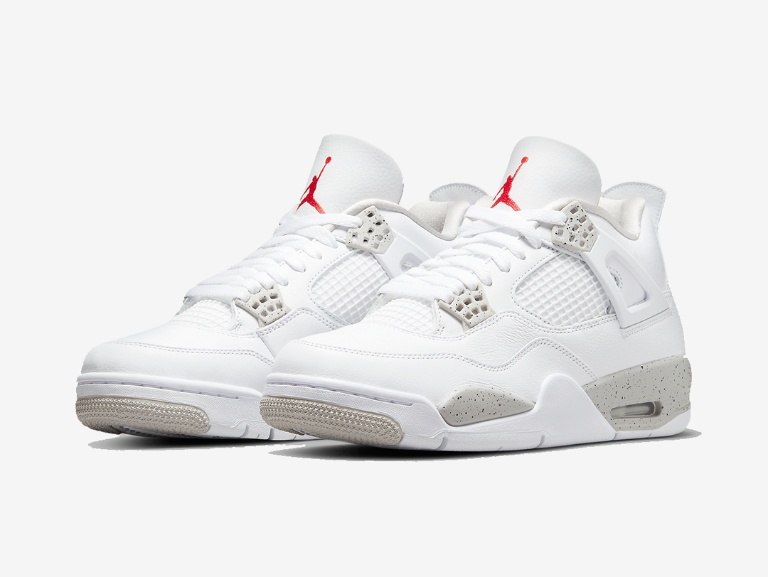 Timeless Jordan 4 sneakers in a classic white and grey colour scheme.