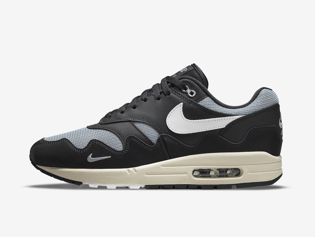 Timeless Air Max 1 sneakers in a classic white and black colour scheme.