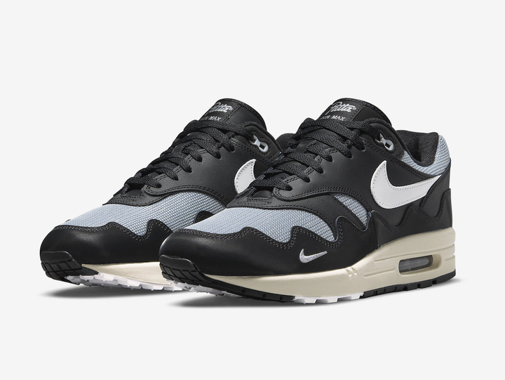 Timeless Air Max 1 sneakers in a classic white and black colour scheme.
