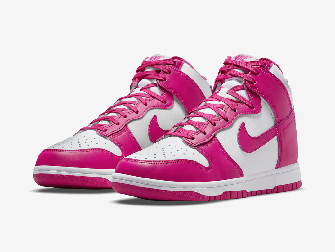 Classic Nike Dunk shoes with a white and pink colourway.