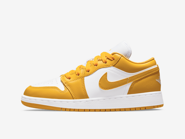 Classic Jordan 1 Low shoes with a white and yellow colourway.