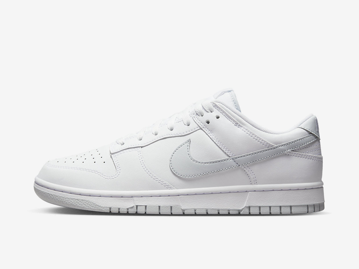 Classic Nike Dunk shoes with a white and grey colourway.