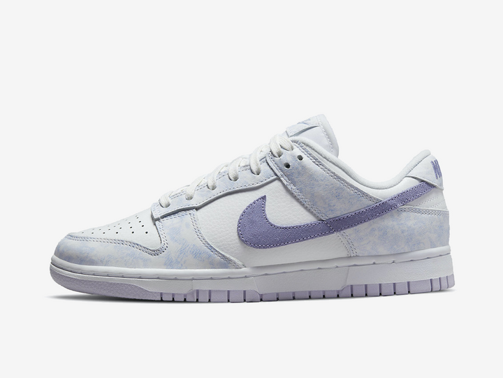 Classic Nike Dunk shoes with a white and purple colourway.