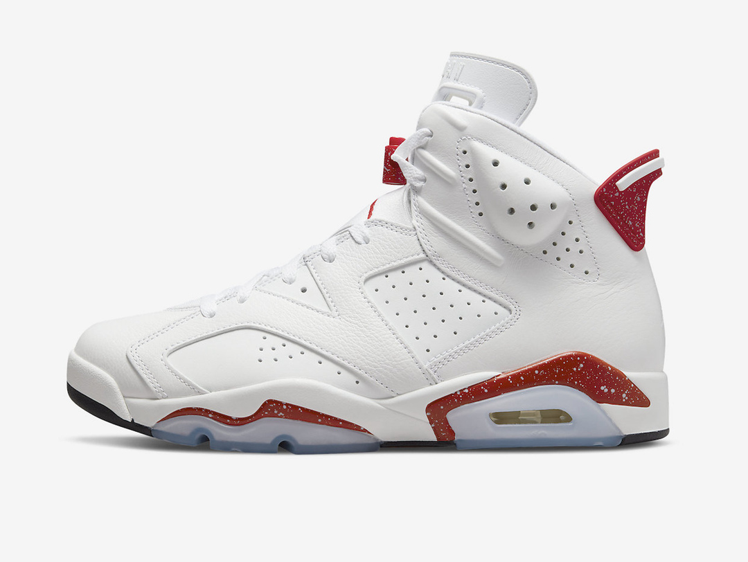 Classic Jordan 6 shoes with a red, white, and black colourway.