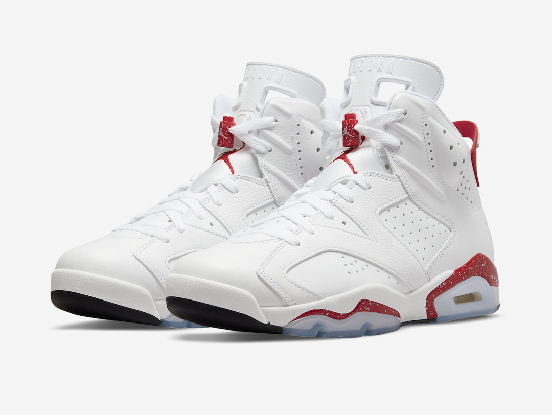 Classic Jordan 6 shoes with a red, white, and black colourway.