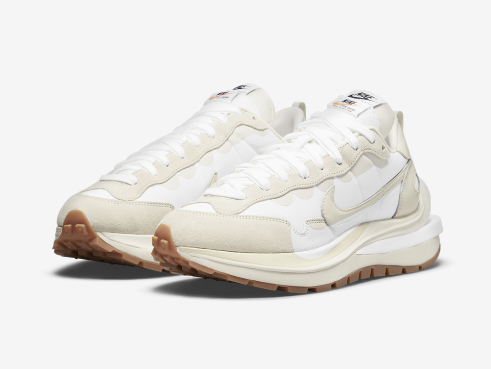 Classic Nike shoes with a white and cream colourway.