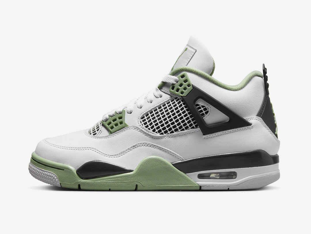 Classic Jordan 4 shoes with a green, white, and black colourway.