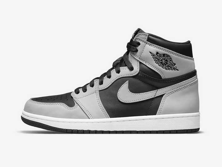 Timeless Air Jordan 1 High sneakers in a classic grey and black color scheme.