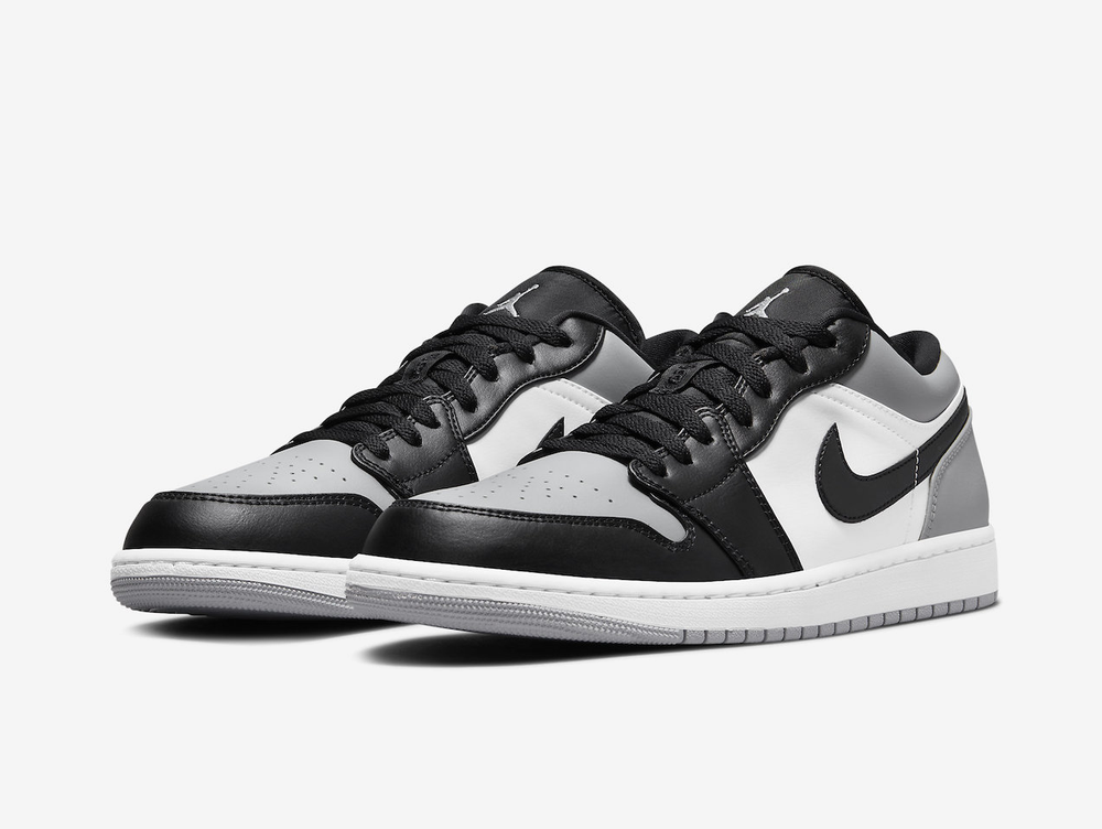 Timeless Air Jordan 1 Low sneakers in a classic grey and black colour scheme.