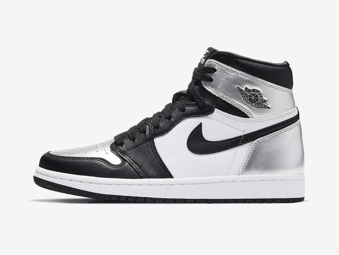 Timeless Air Jordan 1 High sneakers in a classic silver and black colour scheme.