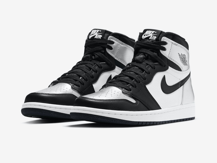 Timeless Air Jordan 1 High sneakers in a classic silver and black colour scheme.