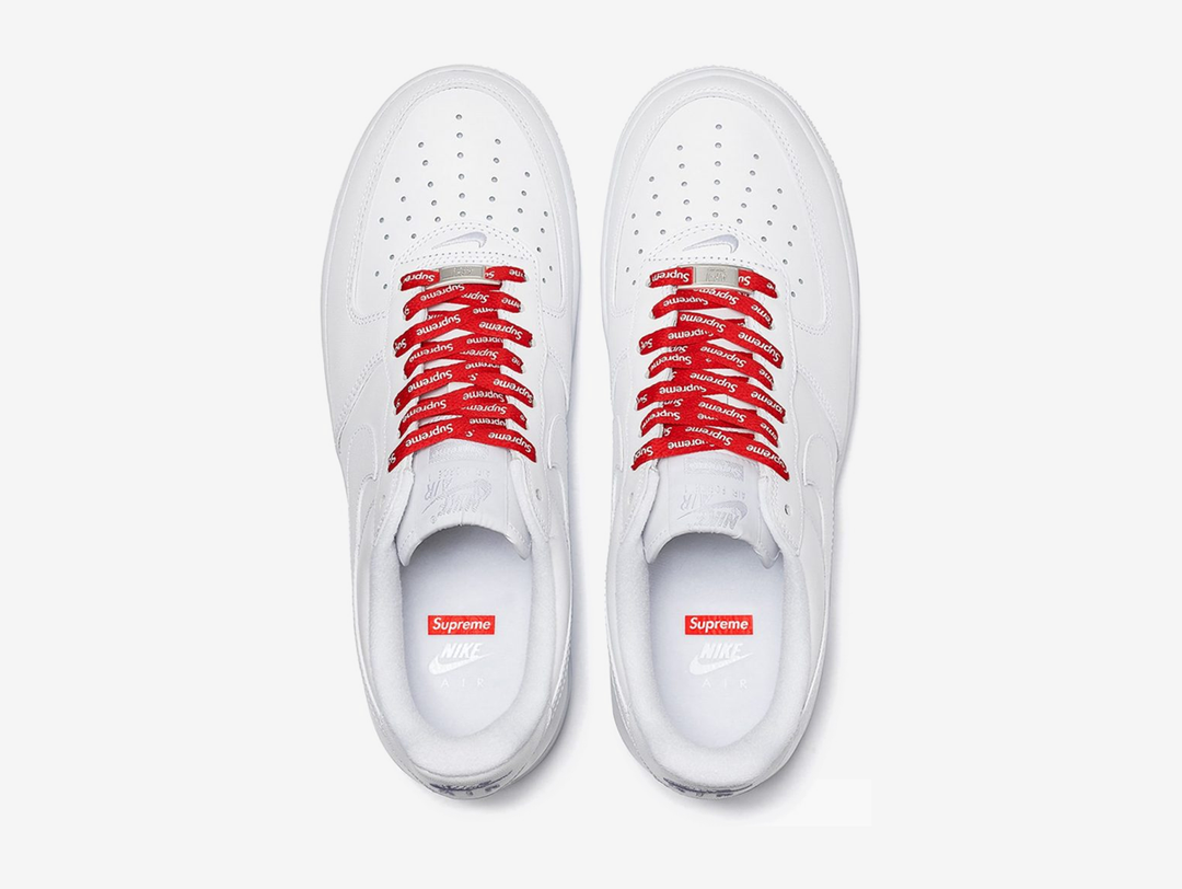 Classic Nike shoes with a white and red colourway.