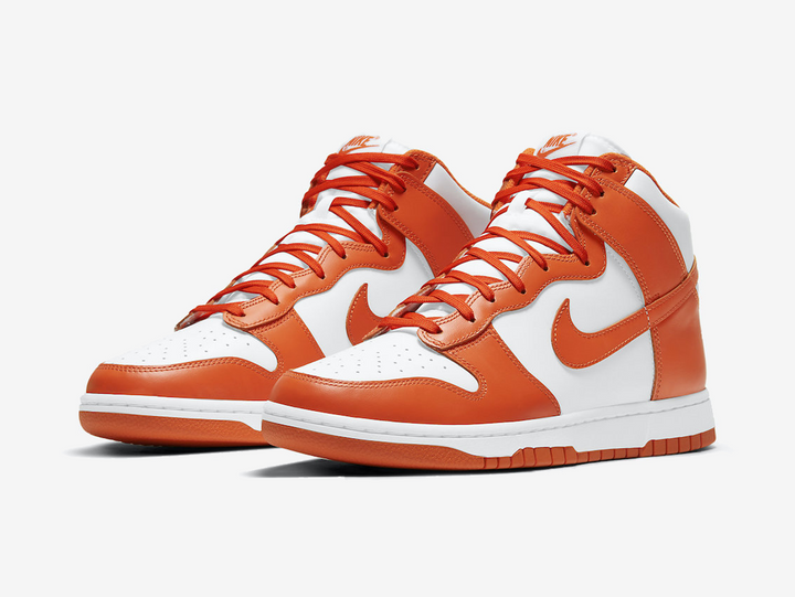 Timeless Nike Dunk sneakers in a classic orange and white colour scheme.
