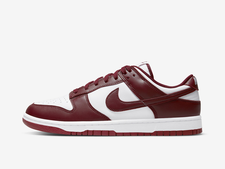 Classic Nike Dunk shoes with a white and maroon colourway.