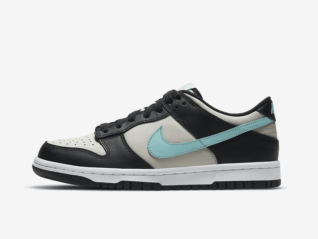 Classic Nike Dunk shoes with a grey and black colourway.