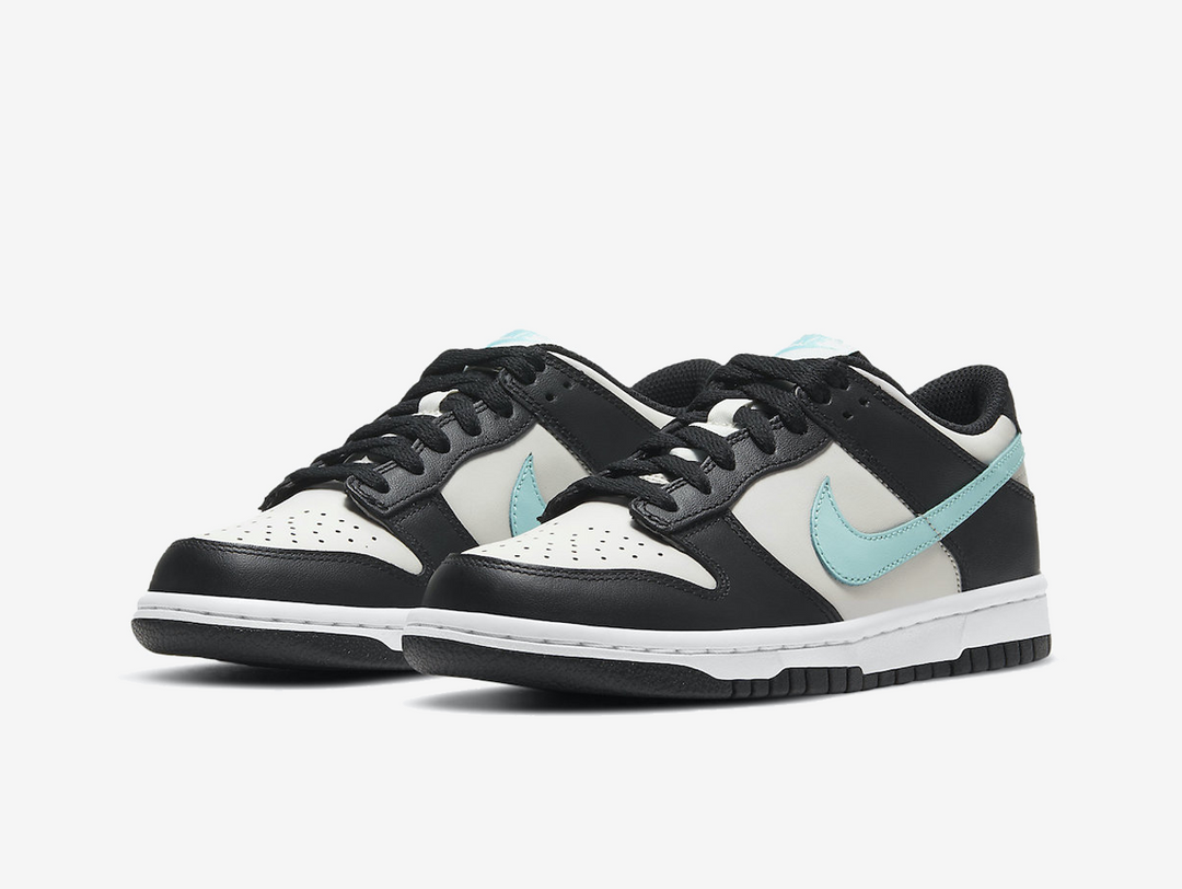 Classic Nike Dunk shoes with a grey and black colourway.