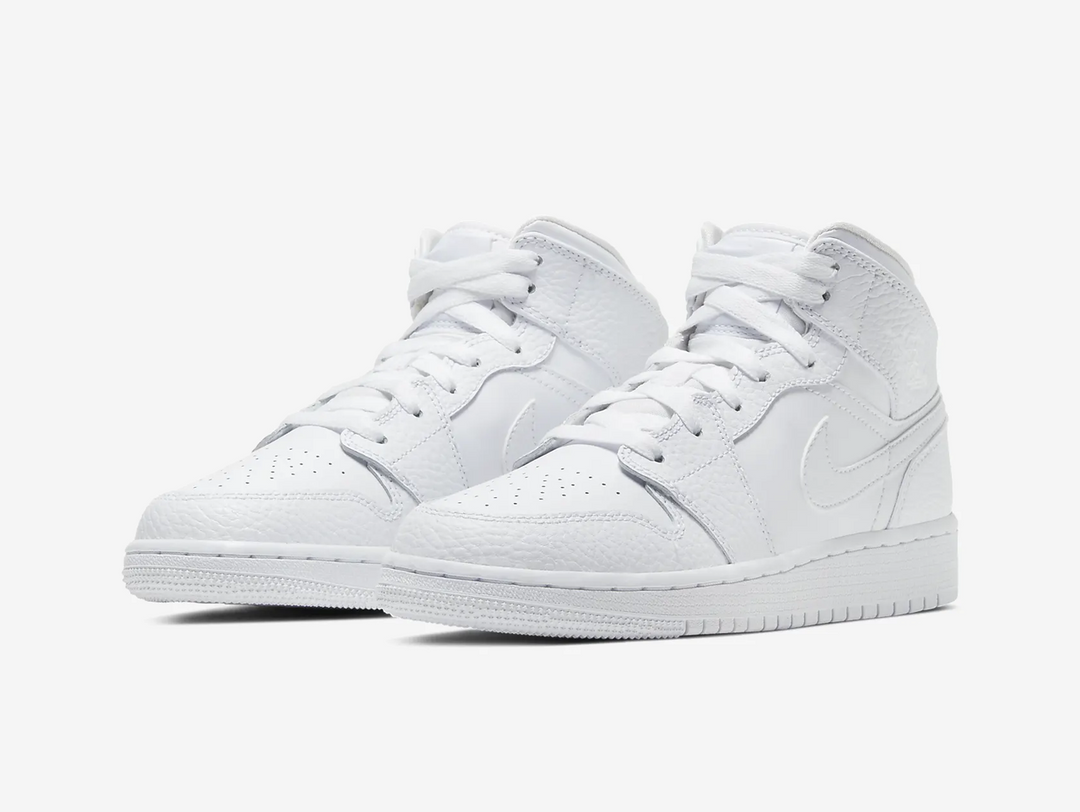 Classic Jordan 1 Mid shoes with an all white colourway.