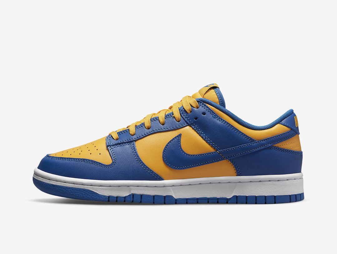 Timeless Nike Dunk sneakers in a classic blue and yellow colour scheme.