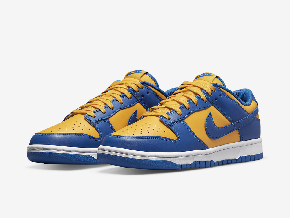 Timeless Nike Dunk sneakers in a classic blue and yellow colour scheme.