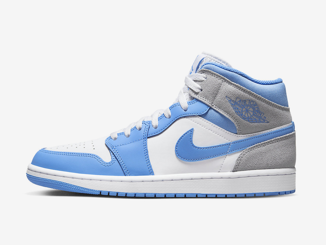 Timeless Air Jordan 1 Mid sneakers in a classic blue and white colour scheme.