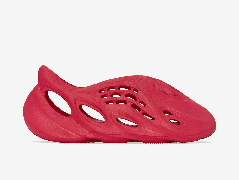 Exclusive Yeezy shoes with a unique red colour scheme.