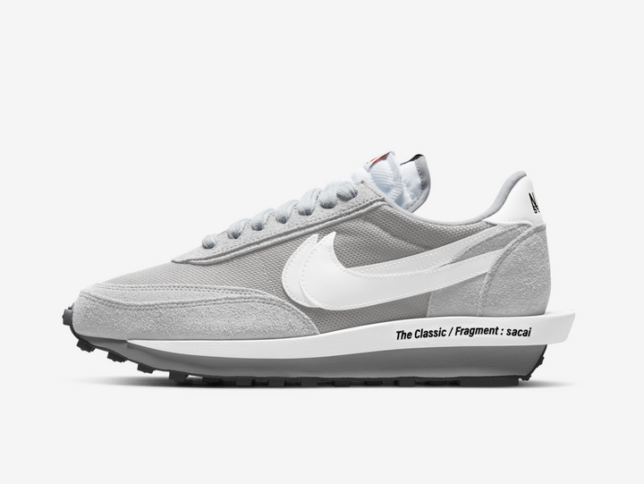 Timeless Nike sneakers in a classic grey and white colour scheme.