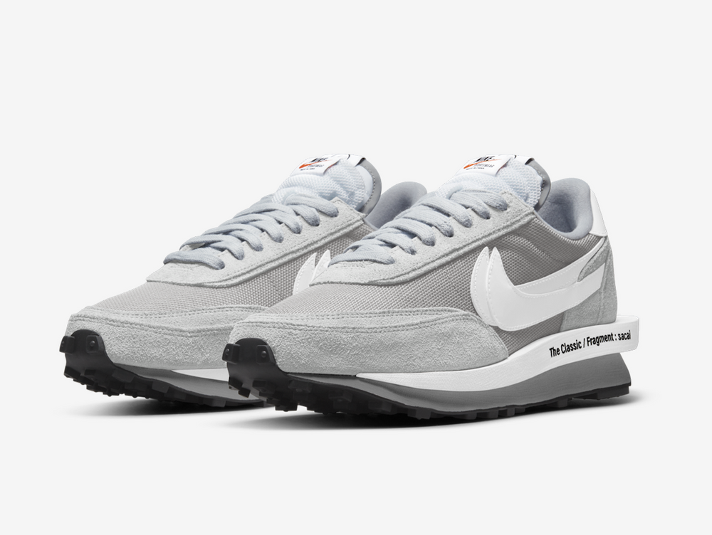 Timeless Nike sneakers in a classic grey and white colour scheme.