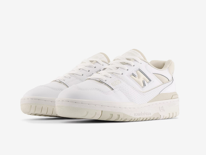 Classic New Balance shoes with a white and cream colourway.