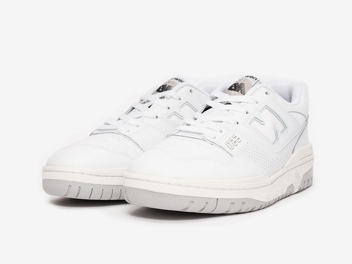 Classic New Balance shoes with a white and grey colourway.